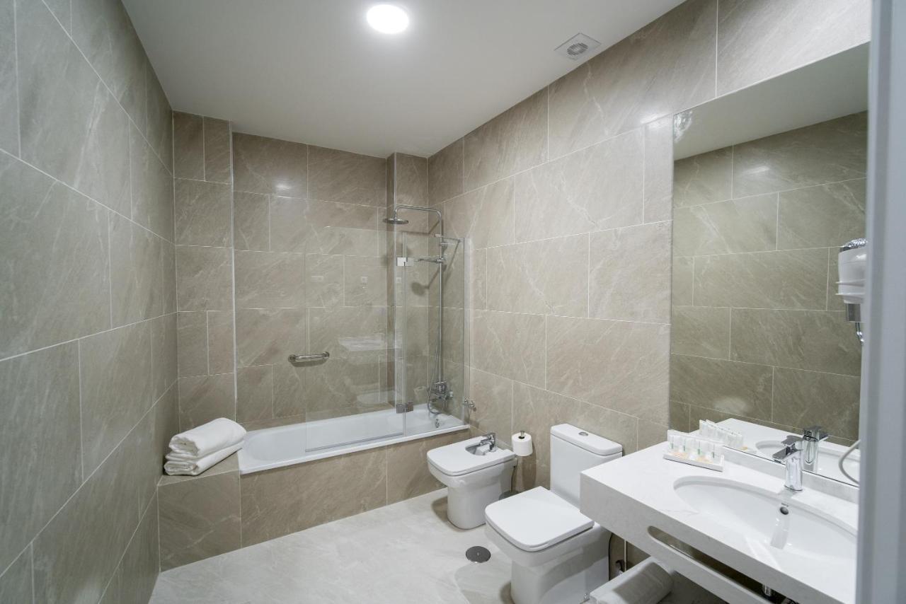 Aparthotel Arco Macarena Lofts Sevilla Exterior foto